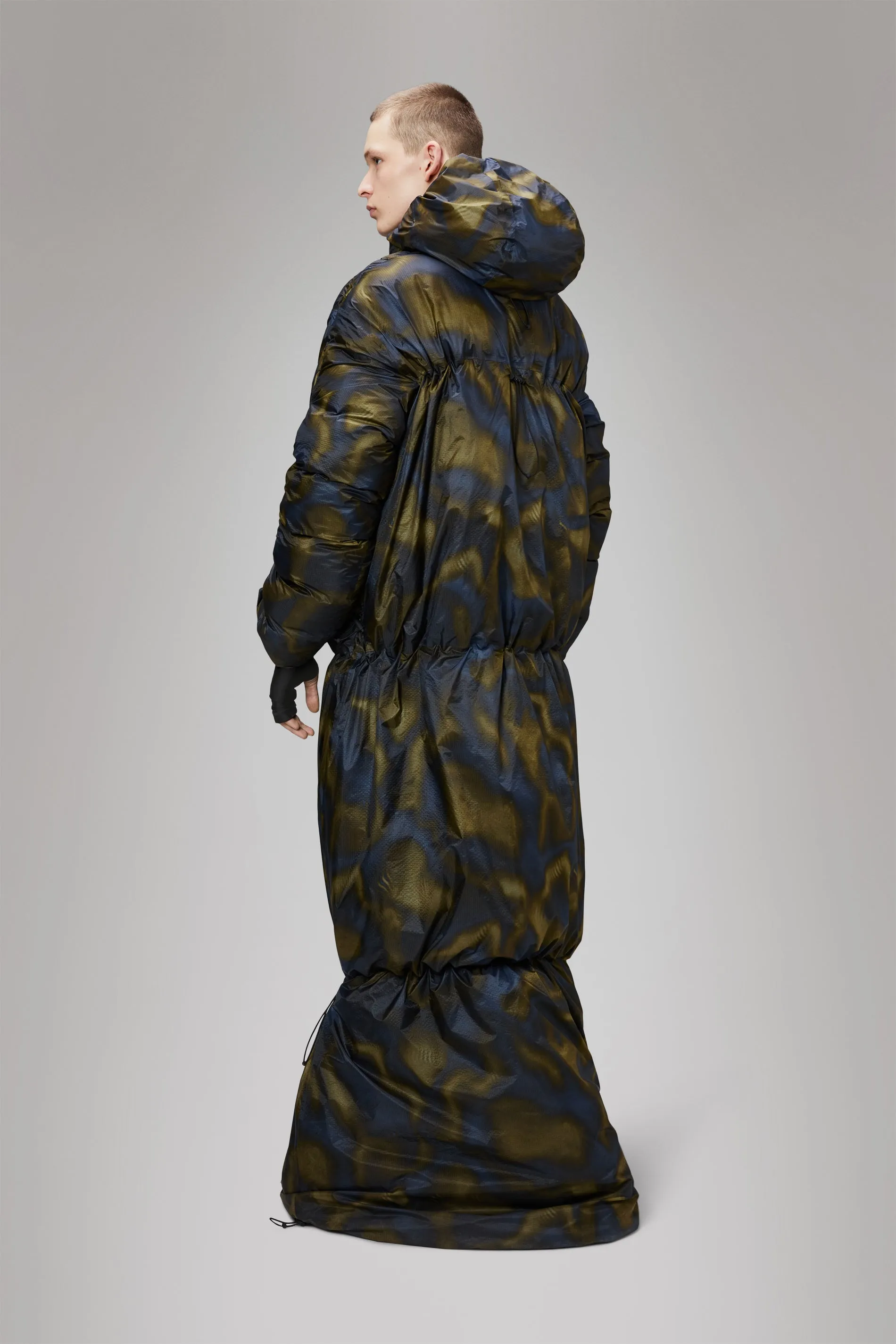 Sure, heres an optimized title with modifiers included:

Kevo Vision Ultra-Long Quilted Puffer Jacket

This title highlights the key features and adds an appealing descriptor to attract customers.